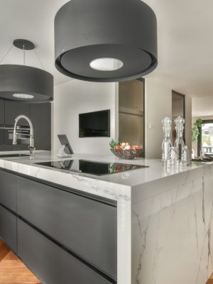 Spacious bright kitchen with dining area, modern design and panoramic windows